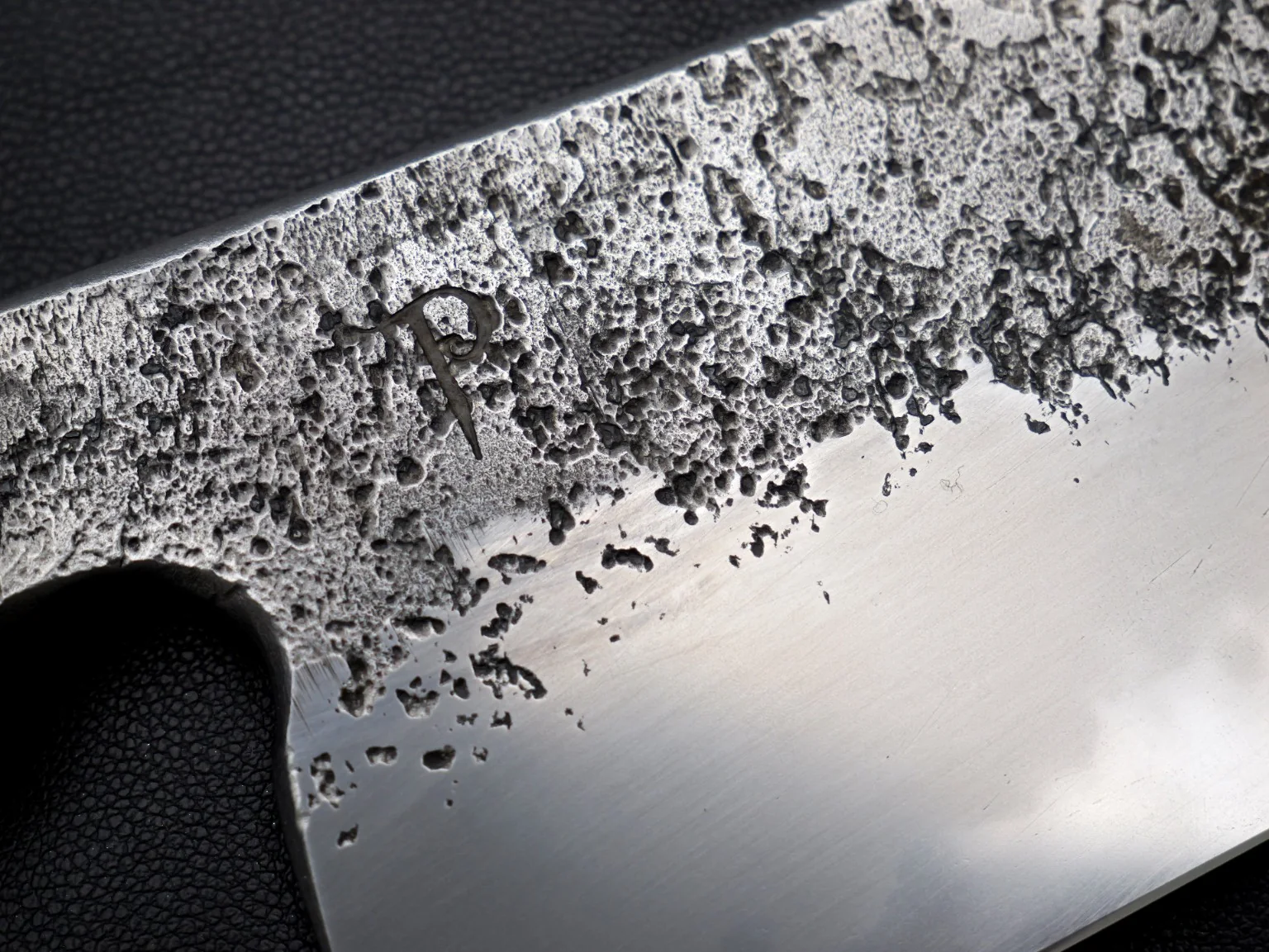 Close-up of forged nashiji texture and Polton maker's mark