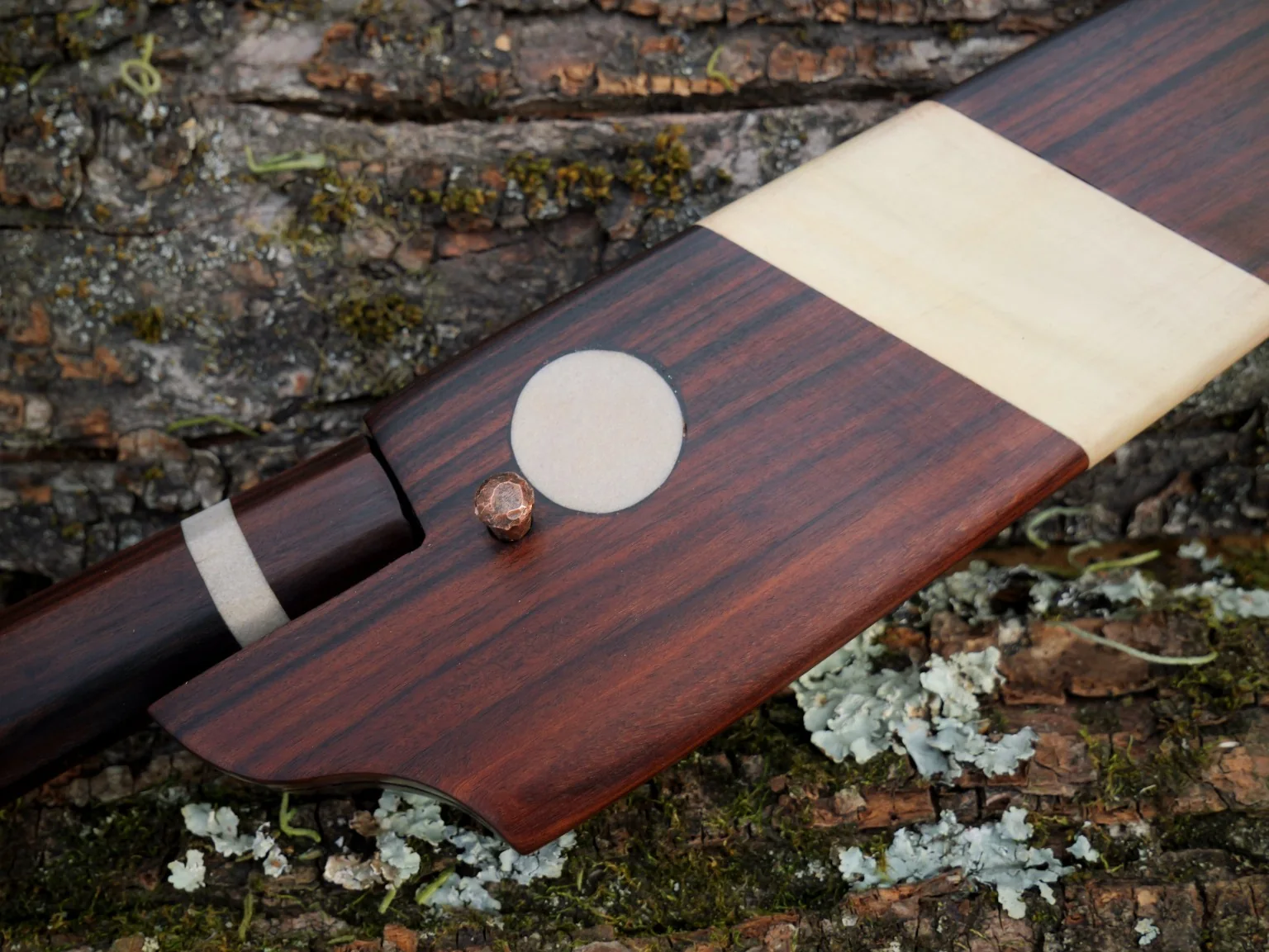 Close detail of wooden saya and pin