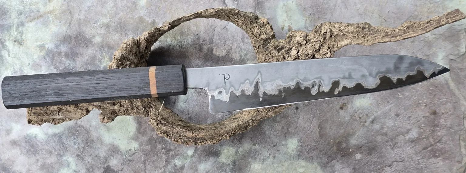 Full profile showing taper and cutting geometry of a forged petty